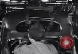 Image of Affixing car frame to chassis Dearborn Michigan USA, 1937, second 49 stock footage video 65675031007