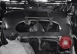 Image of Affixing car frame to chassis Dearborn Michigan USA, 1937, second 50 stock footage video 65675031007