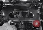 Image of Affixing car frame to chassis Dearborn Michigan USA, 1937, second 51 stock footage video 65675031007