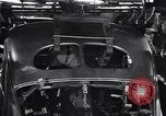 Image of Affixing car frame to chassis Dearborn Michigan USA, 1937, second 55 stock footage video 65675031007