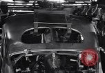 Image of Affixing car frame to chassis Dearborn Michigan USA, 1937, second 59 stock footage video 65675031007