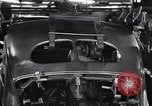 Image of Affixing car frame to chassis Dearborn Michigan USA, 1937, second 60 stock footage video 65675031007