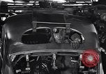 Image of Affixing car frame to chassis Dearborn Michigan USA, 1937, second 61 stock footage video 65675031007