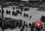 Image of busy intersection United States USA, 1920, second 5 stock footage video 65675031017