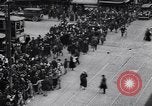 Image of busy intersection United States USA, 1920, second 7 stock footage video 65675031017