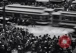 Image of busy intersection United States USA, 1920, second 14 stock footage video 65675031017