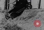 Standbild Ford Model-T auf schlechten Straßen United States USA, 1917, aus Sekunde 27 historischem Filmmaterial Videoclip 65675031035