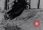 Standbild Ford Model-T auf schlechten Straßen United States USA, 1917, aus Sekunde 28 historischem Filmmaterial Videoclip 65675031035