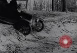 Standbild Ford Model-T auf schlechten Straßen United States USA, 1917, aus Sekunde 38 historischem Filmmaterial Videoclip 65675031035