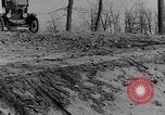 Standbild Ford Model-T auf schlechten Straßen United States USA, 1917, aus Sekunde 43 historischem Filmmaterial Videoclip 65675031035