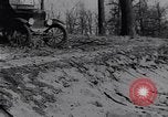 Standbild Ford Model-T auf schlechten Straßen United States USA, 1917, aus Sekunde 45 historischem Filmmaterial Videoclip 65675031035