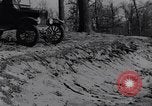 Standbild Ford Model-T auf schlechten Straßen United States USA, 1917, aus Sekunde 46 historischem Filmmaterial Videoclip 65675031035