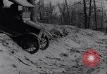 Standbild Ford Model-T auf schlechten Straßen United States USA, 1917, aus Sekunde 48 historischem Filmmaterial Videoclip 65675031035