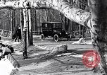 Image of Ford Model-T near icy pond United States USA, 1917, second 4 stock footage video 65675031043