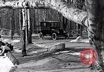 Image of Ford Model-T near icy pond United States USA, 1917, second 5 stock footage video 65675031043