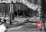 Image of Ford Model-T near icy pond United States USA, 1917, second 6 stock footage video 65675031043
