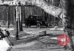 Image of Ford Model-T near icy pond United States USA, 1917, second 7 stock footage video 65675031043