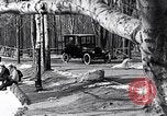 Image of Ford Model-T near icy pond United States USA, 1917, second 12 stock footage video 65675031043