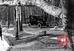 Image of Ford Model-T near icy pond United States USA, 1917, second 20 stock footage video 65675031043