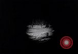 Image of Ford Model-T near icy pond United States USA, 1917, second 26 stock footage video 65675031043