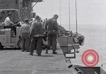 Standbild Cleanup nach USS Forrestal Feuer Golf von Tonkin Vietnam, 1967, aus Sekunde 15 historischem Filmmaterial Videoclip 65675031060