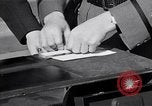 Standbild Fingerprinting United States USA, 1936, aus Sekunde 28 historischem Filmmaterial Videoclip 65675031189