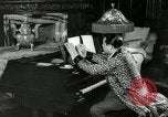 Immagine di Grande del jazz di Duke Ellington suona il pianoforte New York City USA, 1943, secondo 34 filmato di repertorio 65675031232