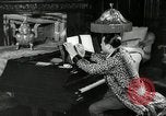 Immagine di Grande del jazz di Duke Ellington suona il pianoforte New York City USA, 1943, secondo 35 filmato di repertorio 65675031232