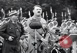 Image of Adolf Hitler reviews brown shirts Germany, 1933, second 17 stock footage video 65675031413