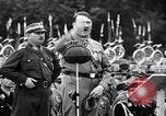 Image of Adolf Hitler reviews brown shirts Germany, 1933, second 32 stock footage video 65675031413