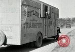 Image of trucks and vans United States USA, 1927, second 58 stock footage video 65675031465