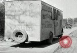 Image of trucks and vans United States USA, 1927, second 59 stock footage video 65675031465