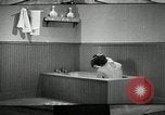 Image of bath facilities United States USA, 1936, second 56 stock footage video 65675031479