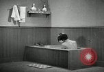 Image of bath facilities United States USA, 1936, second 57 stock footage video 65675031479