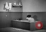 Image of bath facilities United States USA, 1936, second 58 stock footage video 65675031479