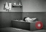 Image of bath facilities United States USA, 1936, second 60 stock footage video 65675031479