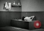 Image of bath facilities United States USA, 1936, second 62 stock footage video 65675031479