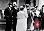 Image of Well dressed African-Americans waiting at a school near a Tennessee Emergency relief camp Tennessee USA, 1936, second 1 stock footage video 65675031562