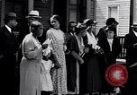 Image of Well dressed African-Americans waiting at a school near a Tennessee Emergency relief camp Tennessee USA, 1936, second 4 stock footage video 65675031562