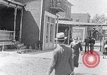 Image of Well dressed African-Americans waiting at a school near a Tennessee Emergency relief camp Tennessee USA, 1936, second 12 stock footage video 65675031562