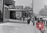 Image of Well dressed African-Americans waiting at a school near a Tennessee Emergency relief camp Tennessee USA, 1936, second 15 stock footage video 65675031562