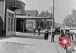 Image of Well dressed African-Americans waiting at a school near a Tennessee Emergency relief camp Tennessee USA, 1936, second 16 stock footage video 65675031562