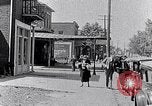 Image of Well dressed African-Americans waiting at a school near a Tennessee Emergency relief camp Tennessee USA, 1936, second 18 stock footage video 65675031562