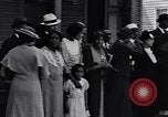 Image of Well dressed African-Americans waiting at a school near a Tennessee Emergency relief camp Tennessee USA, 1936, second 20 stock footage video 65675031562