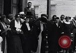 Image of Well dressed African-Americans waiting at a school near a Tennessee Emergency relief camp Tennessee USA, 1936, second 22 stock footage video 65675031562