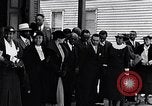 Image of Well dressed African-Americans waiting at a school near a Tennessee Emergency relief camp Tennessee USA, 1936, second 23 stock footage video 65675031562