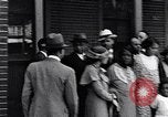 Image of Well dressed African-Americans waiting at a school near a Tennessee Emergency relief camp Tennessee USA, 1936, second 25 stock footage video 65675031562