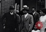 Image of Well dressed African-Americans waiting at a school near a Tennessee Emergency relief camp Tennessee USA, 1936, second 27 stock footage video 65675031562