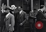 Image of Well dressed African-Americans waiting at a school near a Tennessee Emergency relief camp Tennessee USA, 1936, second 29 stock footage video 65675031562