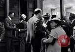 Image of Well dressed African-Americans waiting at a school near a Tennessee Emergency relief camp Tennessee USA, 1936, second 32 stock footage video 65675031562